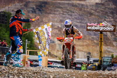 Manuel Lettenbichler crosses the finish line in first place at Red Bull Erzbergrodeo 2025 in Eisenerz, Austria. 