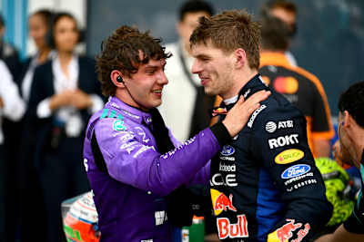 Race winner Andrea Kimi Antonelli of Mercedes embraces Oracle Red Bull Racing's Max Verstappen after an incident packed race at the Miami Grand Prix. 