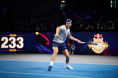 Joël Schwärzler in action at Red Bull Bassline Vienna 2024, with his tennis shot clocked at 233kph