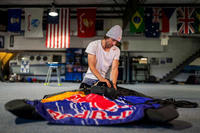 Sebastián Álvarez prepares his wingsuit for the Red Bull Starman project