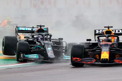 Max Verstappen and Lewis Hamilton battle for track position at the start during the F1 Grand Prix of Emilia Romagna at Autodromo Enzo e Dino Ferrari on April 18, 2021 in Imola, Italy.