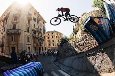 Mountain biker Johannes Fischbach launches off a ramp during Red Bull Genova Cerro Abajo in Genoa, Italy. 