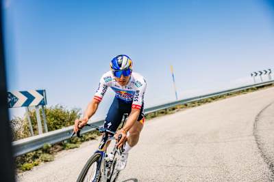 In May 2026, Florian Lipowitz of Red Bull – BORA – hansgrohe pushes hard during the Tour de France jersey photoshoot on the winding roads of Sierra Nevada, Spain