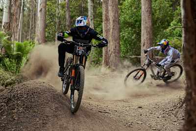Aaron Gwin and Asa Vermette ride during practice at Red Bull Hardline Tasmania in 2026.