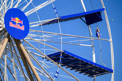 Ida Mathilde Steensgaard climbs a rope while on a moving Ferris wheel in Odense, Denmark. 