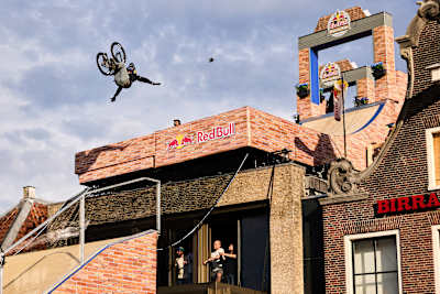 Tim Bringer performs a gravity-defying trick at Red Bull District Ride in Groningen, The Netherlands on July 25, 2026.