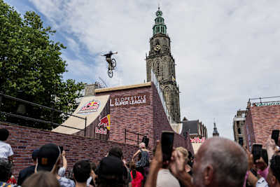Alma Wiggberg sends a daring aerial trick during Red Bull District Ride in Groningen, Netherlands, thrilling the crowd at the Slopestyle Super League event on 25 July 2026