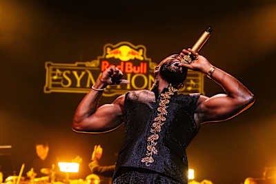 November 2025: Tayc delivers a powerful live performance at Red Bull Symphonic in Paris, bringing electrifying energy to the Théâtre des Champs-Elysées stage