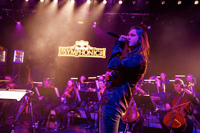 In 2025, Dino Jelusic captivates the audience at HNK2 in Zagreb, Croatia during Red Bull Symphonic, blending rock vocals with orchestral power for an electrifying performance