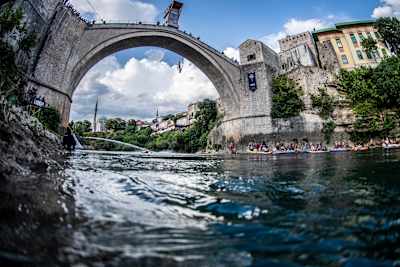Gary Hunt of France dives from the 27-metre platform on Stari Most during the 2022 Red Bull Cliff Diving World Series final competition day in Mostar, Bosnia and Herzegovina