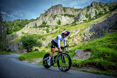 Zoe Bäckstedt rides through Cheddar Gorge in Cheddar, United Kingdom, on 30 June 2026, wearing Red Bull and Canyon kit against the dramatic limestone cliffs