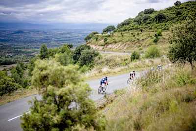 Nico Denz of Red Bull - BORA - hansgrohe races down a mountain road during Stage 18 of La Vuelta 2024 from Vitoria-Gasteiz to Maeztu-Parque Natural de Izki, Spain