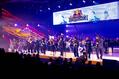 Artists and musicians perform together on the vibrant Red Bull Symphonic stage in São Paulo, Brazil, on 8 August 2026.