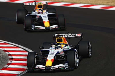 Arvid Lindblad leads Liam Lawson on track during the F1 Grand Prix of Hungary at Hungaroring on July 26, 2026 in Budapest, Hungary.