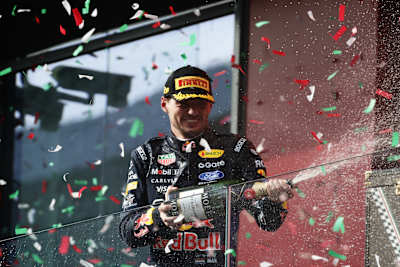 Second placed Max Verstappen of the Netherlands and Oracle Red Bull Racing sprays Champagne on the podium during the F1 Grand Prix of Hungary at Hungaroring on July 26, 2026 in Budapest, Hungary.