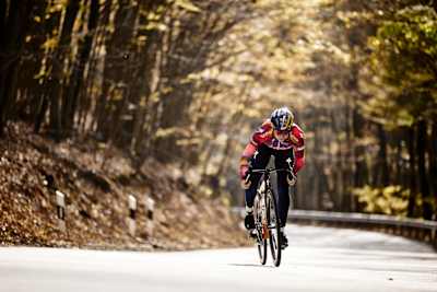 Kata Blanka Vas rides through an autumn forest near Budapest, Hungary, during a training session in November 2024.