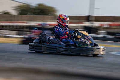 Sebastian Job drives a Red Bull kart during Max vs 100 at Silverstone, Great Britain, on 22 July 2026, captured in a dramatic high-speed trackside shot