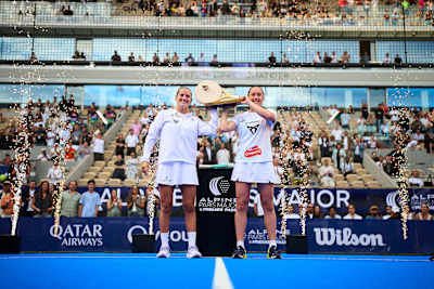 Ariana Sánchez Fallada and Andrea Ustero Prieto celebrate their Premier Padel Major Paris 2026 victory with the trophies during the trophy ceremony in Paris