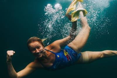 Rhiannan Iffland of Australia celebrates underwater after her 22-metre dive during the 2025 Red Bull Cliff Diving World Series in El Nido, Philippines