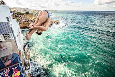 On 25 September 2026, Aidan Heslop of the UK launches from a 26-metre balcony during the Red Bull Cliff Diving World Series in Polignano a Mare, Italy