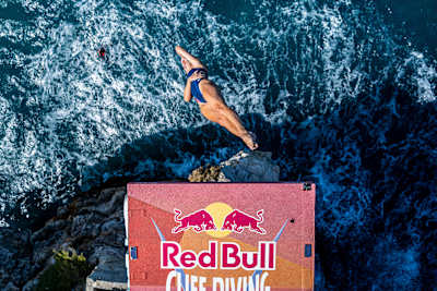 Elisa Cosetti of Italy dives from the 22-metre platform during the 2026 Red Bull Cliff Diving World Series final stop in Polignano a Mare, Italy, on 26 September