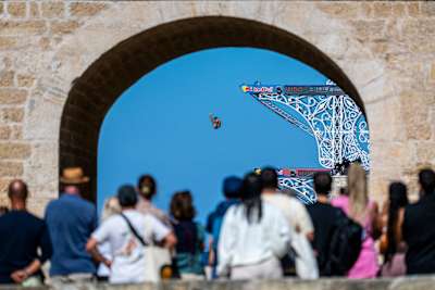 Andrea Barnaba of Italy dives from the 27-metre platform during the 2026 Red Bull Cliff Diving World Series final stop in Polignano a Mare, Italy