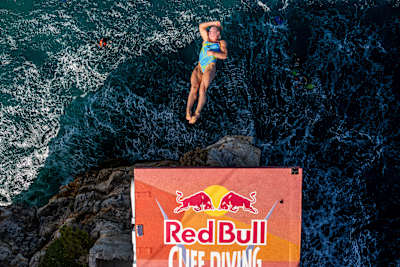 Lisa Faulkner of the USA dives from the 22-metre platform during the 2026 Red Bull Cliff Diving World Series final stop in Polignano a Mare, Italy