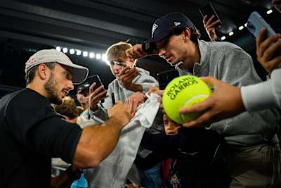 Alejandro Galán signs autographs and meets fans after winning the 2025 Alpine Paris Major Premier Padel semi-final at Roland Garros Stadium in Paris, France