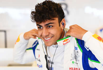 Arvid Lindblad of Great Britain and Visa Cash App Racing Bulls prepares to drive in the garage during F1 Testing at Yas Marina Circuit on December 09, 2025 in Abu Dhabi, United Arab Emirates. 