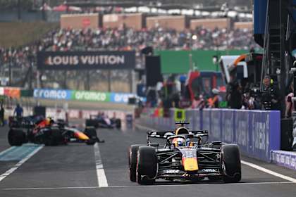 Max Verstappen leaves the pit lane during qualifying ahead of the F1 Grand Prix of Japan at Suzuka Circuit in 2026 