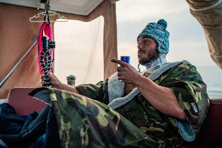 Ross Edgley rests up with and shoots a Vlog during his Great British Swim attempt.