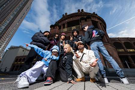 The 8 wildcards of the Red Bull Dance Your Style World Final 2023 posing for a group shot at the Festhall in Frankfurt, Germany, on November 3rd, 2023.