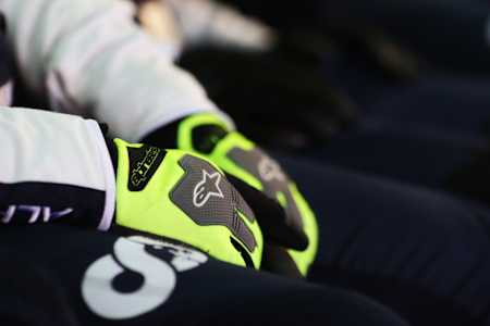 A detailed view of the gloves of a Scuderia AlphaTauri team member in the garage during the F1 Grand Prix of Emilia Romagna at Autodromo Enzo e Dino Ferrari on April 18, 2021 in Imola, Italy.