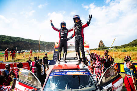 Sebastien Ogier and Vincent Landais celebrate winning the Kenyan round of the World Rally Championship in Naivasha, Kenya, on June 25, 2023.