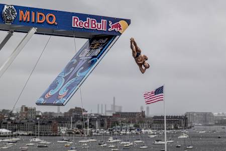 Constantin Popovici of Romania dives from the 27.5 metre platform during the final competition day of the first stop of the Red Bull Cliff Diving World Series in Boston, USA on June 03, 2023.  