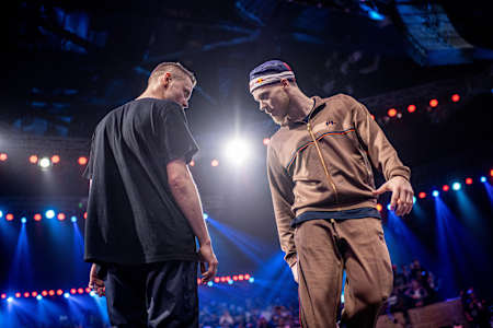 Killa Kolya (L) of Kazakhstan competes against Menno (R) of the Netherlands during the Red Bull BC One World Final at the National Sports Club of India (NSCI) in Mumbai, India on November 9, 2019. 