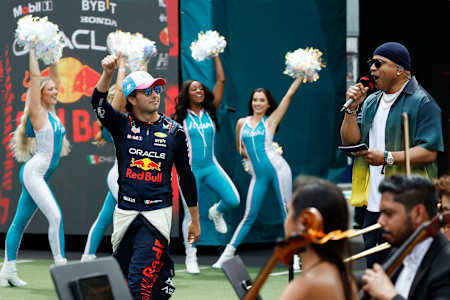 Sergio Perez of Mexico and Oracle Red Bull Racing walks out onto the grid prior to the F1 Grand Prix of Miami at Miami International Autodrome on May 07, 2023 in Miami, Florida