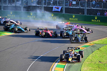 Max Verstappen leads Lewis Hamilton of Great Britain and the rest of the field at the second restart of the F1 Grand Prix of Australia at Albert Park on April 02, 2023 in Melbourne, Australia.