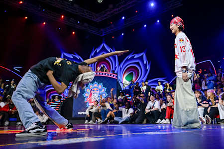Rubix of France battles against D.Soraki of Japan during Red Bull Dance Your Style World Finals at NSCI Stadium in Mumbai, India on November 9, 2024. 