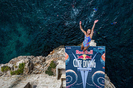 Rhiannan Iffland launches into her dive at the Red Bull Cliff Diving World Series event in Polignano a Mare, Italy