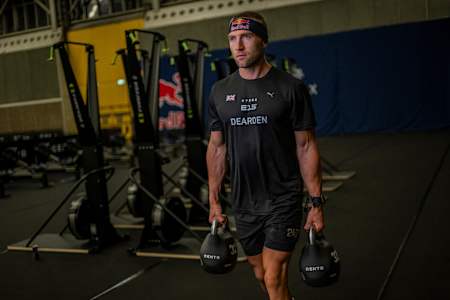 Jake suggests training six days a week, combining Hyrox-specific exercises like farmer's carries with running to get prepped for the course