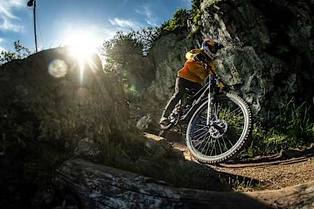 Thomas Genon tackles a technical rocky section at Red Bull Hardline in Dinas Mawddwy, United Kingdom, on June 2, 2024