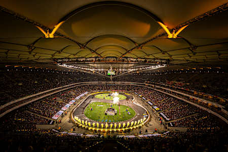 In 2024, a packed stadium hosts the Drift Masters event in Warsaw, Poland.