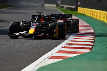 Max Verstappen of the Netherlands driving the (1) Oracle Red Bull Racing RB19 leads Carlos Sainz of Spain driving (55) the Ferrari SF-23 during the F1 Grand Prix of Mexico. 