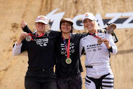 Harriet Burbidge-Smith, Robin Goomes and Caroline Buchanan on the podium at the Maxxis Slopestyle in Memory of McGazza at Crankworx in Rotorua, New Zealand on March 24, 2024. 