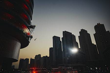 Helena Mertendives from the 20.5 metre platform on the Dubai Marina Pier 7 building prior to the Red Bull Cliff Diving World Series in Dubai, UAE on October 26, 2016.