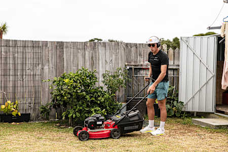 Hayden Wilde mows his parents lawn in Whakatane, NZ on December 19, 2023.
