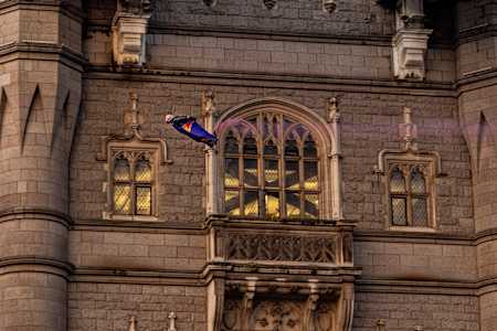 Marco Fuerst of Austria flies through Tower Bridge in London, Great Britain on May 12, 2024.