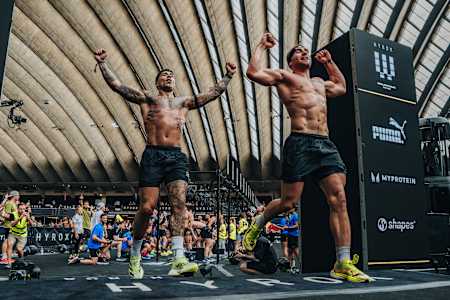 Jake Dearden and Marc Dean cross the finish line and take the win in Doubles category at the Hyrox World Championship in Nice, France, on June 9, 2024. 