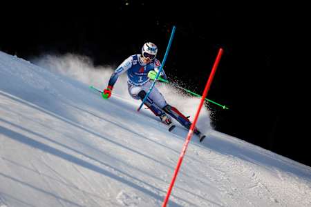 In the 2023-2024 season, Henrik Kristoffersen carves through snow during Red Bull's Hahnenkamm race in Kitzbühel, Austria